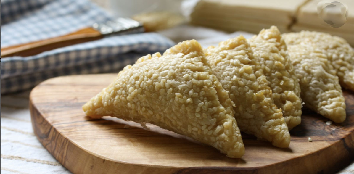 Cheese Borekas.  Gluten free puff pastry squares filled with assorted cheese fillings; topped with sesame seeds. Frozen and ready to bake, 1 dozen